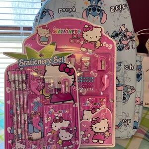 filled stitch backpack with hello kitty stationary
